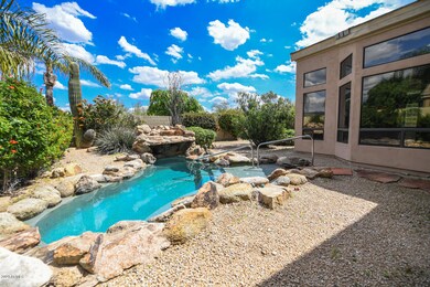 Backyard w pool and water feature