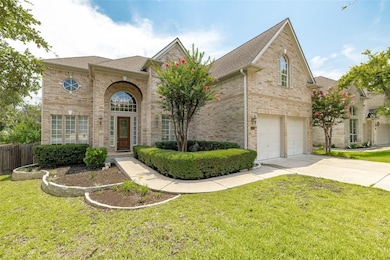 Traditional-style home featuring brick siding, an