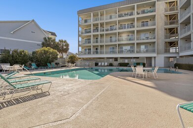Community pool featuring a patio area