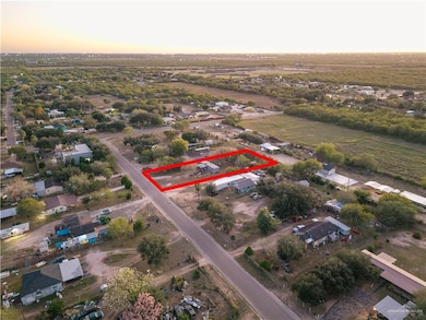 Aerial view at dusk of property boundaries highlighted