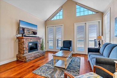Inviting living room with a few & vaulte