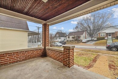 Covered front porch to relax & drink you morning coffee on.