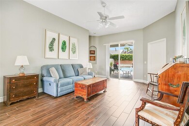 A lovely view of the pool as you enter the home