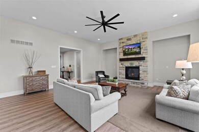 Ceiling fans and custom lighting were added to man