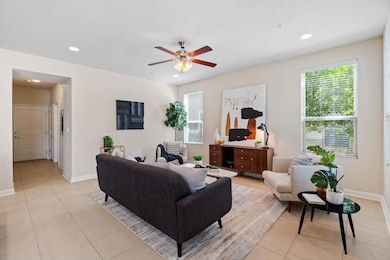 View from the living area into the hallway leading to a convenient first-floor bedroom and full bathroom ~