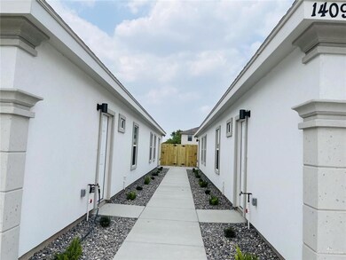 View of side of home with stucco siding