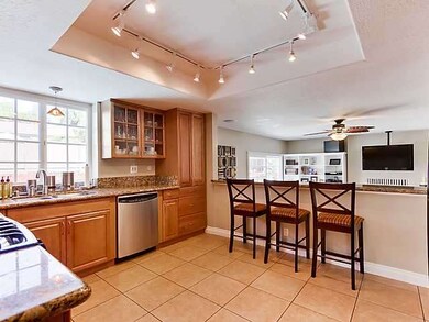 Another view of the kitchen which opens to the Fam