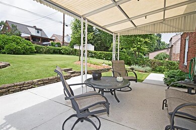 Entertain this summer on a covered concrete patio!