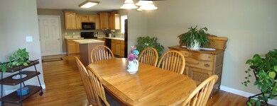 view of kitchen from dining pano