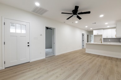 Step inside and be greeted by fresh, neutral paint