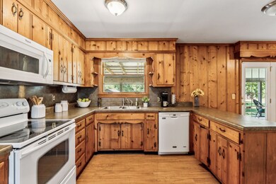 Large Kitchen area overlooking the backyard