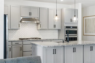 additional view of upgraded kitchen new hardware and lighting