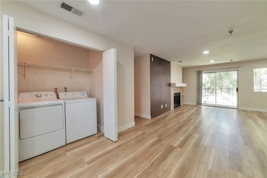 Laundry room with washing machine and clothes drye