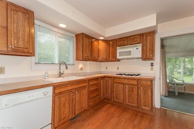 This fantastic working kitchen has a high-arc pull