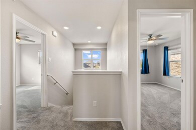 Hall with an upstairs landing, carpet, plenty of 