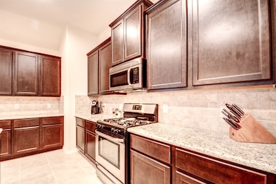 Complete with a gas range, stainless steel applian