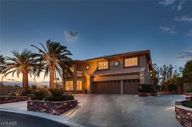 Mediterranean / spanish house featuring a tile roo