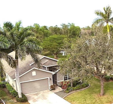 View of front facade featuring a garage and a fron