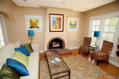 Pretty living room with stained-glass windows and 