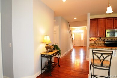 Wide Hall way helps show off the beautiful wood fl