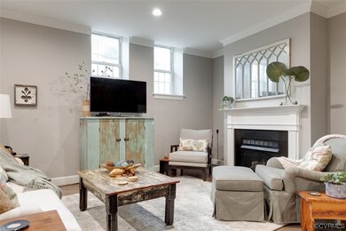 Nice details--crown moulding, custom mantel.