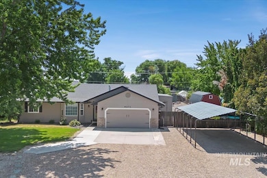 Ranch-style house featuring driveway, an attached garage, stone siding, and a shingled roof