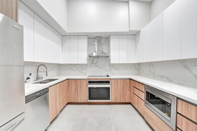 Brand new kitchen with extra cabinetry, double sink, skylight.