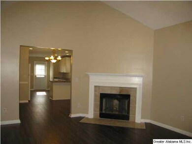 The Great Room with a cathedral ceiling . Enjoy co
