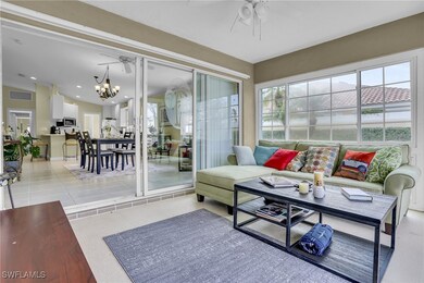 Sunroom with a chandelier