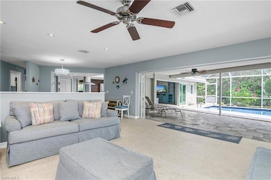 Living room looking out onto the pool area