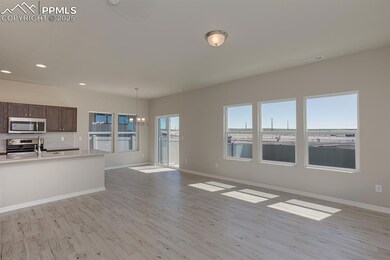 Unfurnished living room featuring light wood finis