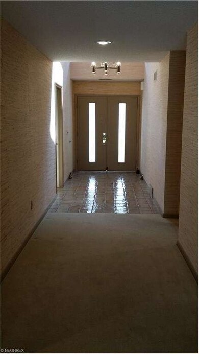 The two story foyer.  Facing the door, to the left