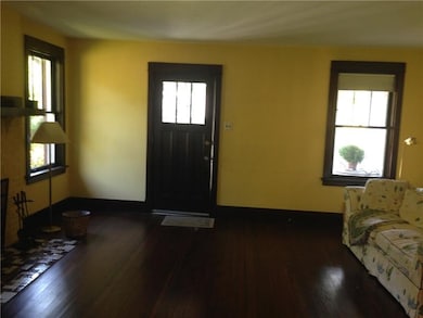 Spacious Living Room with beautiful HW floors.