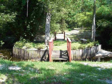 THE LOT IS ACROSS THE BRIDGE