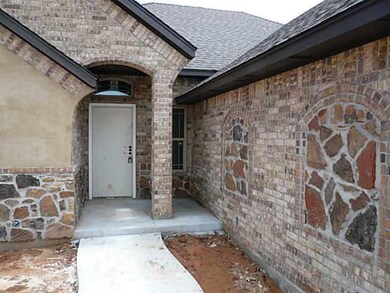 Exterior Front. Estimated completion date June.