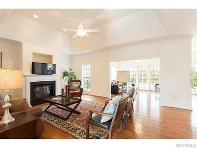 Family room opens to sunroom and remodeled kitchen
