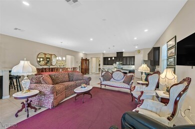 Living area featuring recessed lighting, a chandel