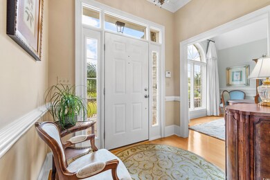 Foyer entrance with ornamental molding, light hard