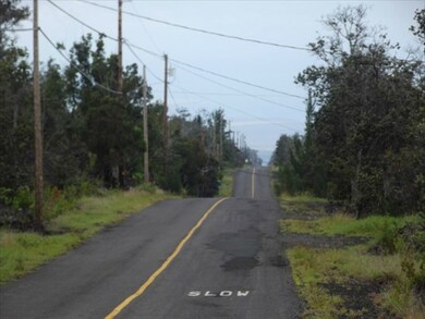 on the left going down the road