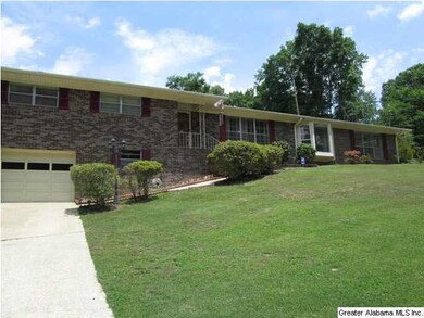 Front view showing basement garage.