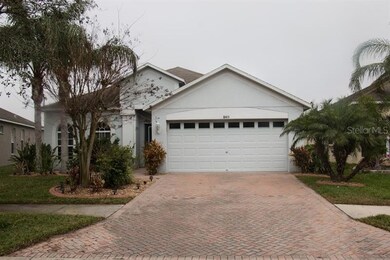 STREET VIEW OF HOME WITH PAVER DRIVE