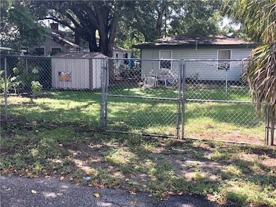 Gate at the back of the lot is on an alley way. Ga