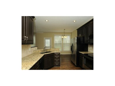 Gorgeous granite, tumbled marble backsplash, resto