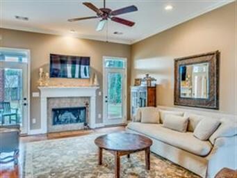 Large living room with fireplace and access to out