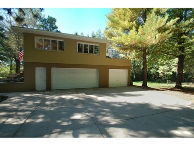 Cement deck in the back, over the 2nd garage which