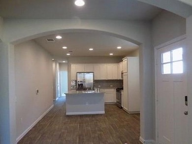 Kitchen with appliances with stainless steel fini