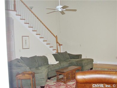 Family Room ATTRACTIVE STAIRWAY ADDS TO THE BEAUTY