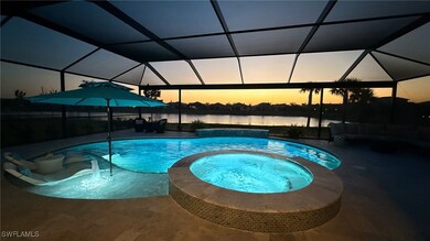 View of swimming pool featuring a water view, a po