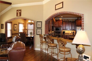 Gentle brick arches with counter to kitchen.