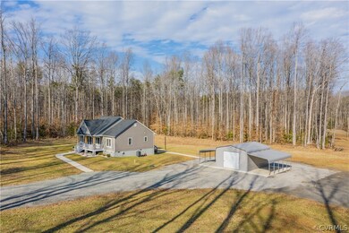 An aerial view of the home and garage.